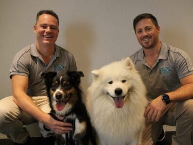 Dogs posing with the doctors
